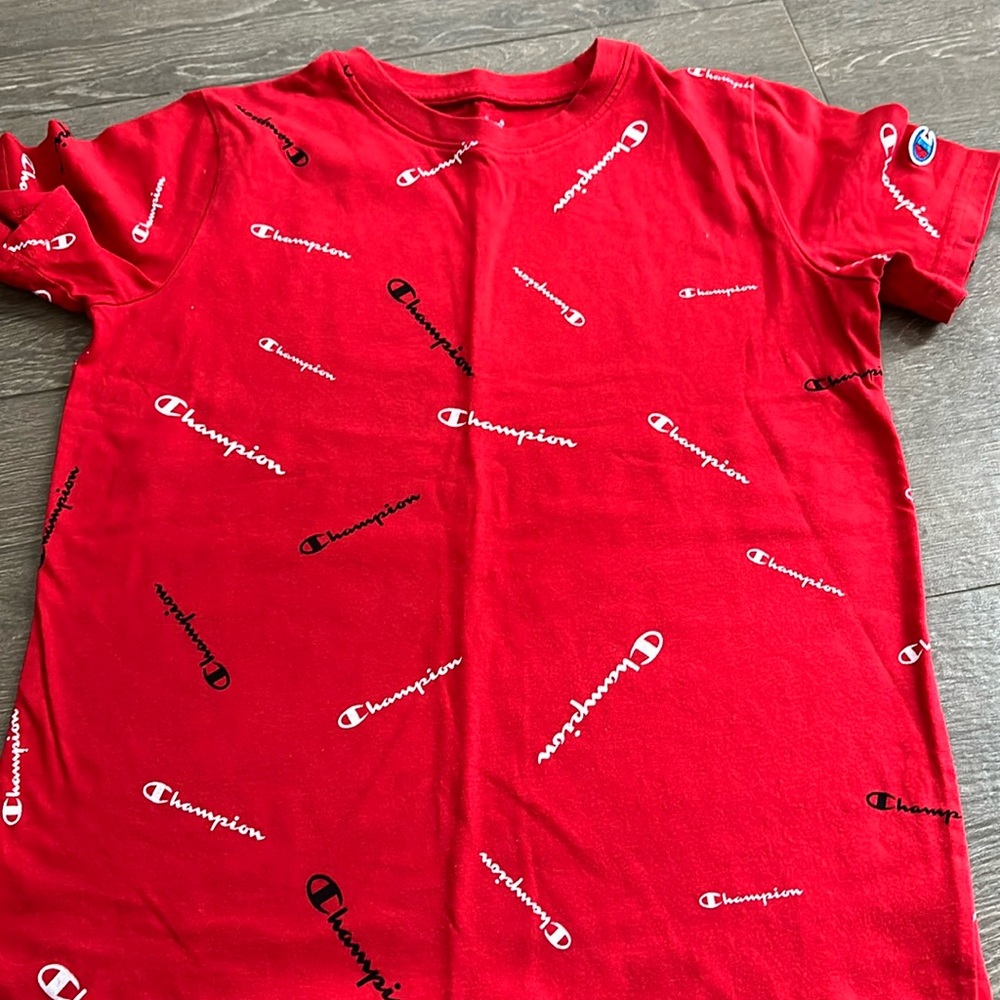 Boys Champion Tshirt. Size medium (12)